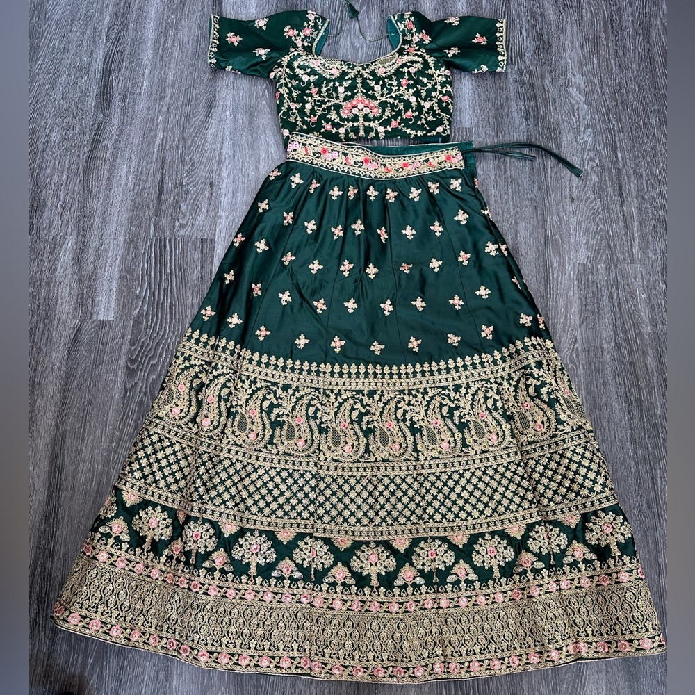 Green lehenga choli with gold embroidery